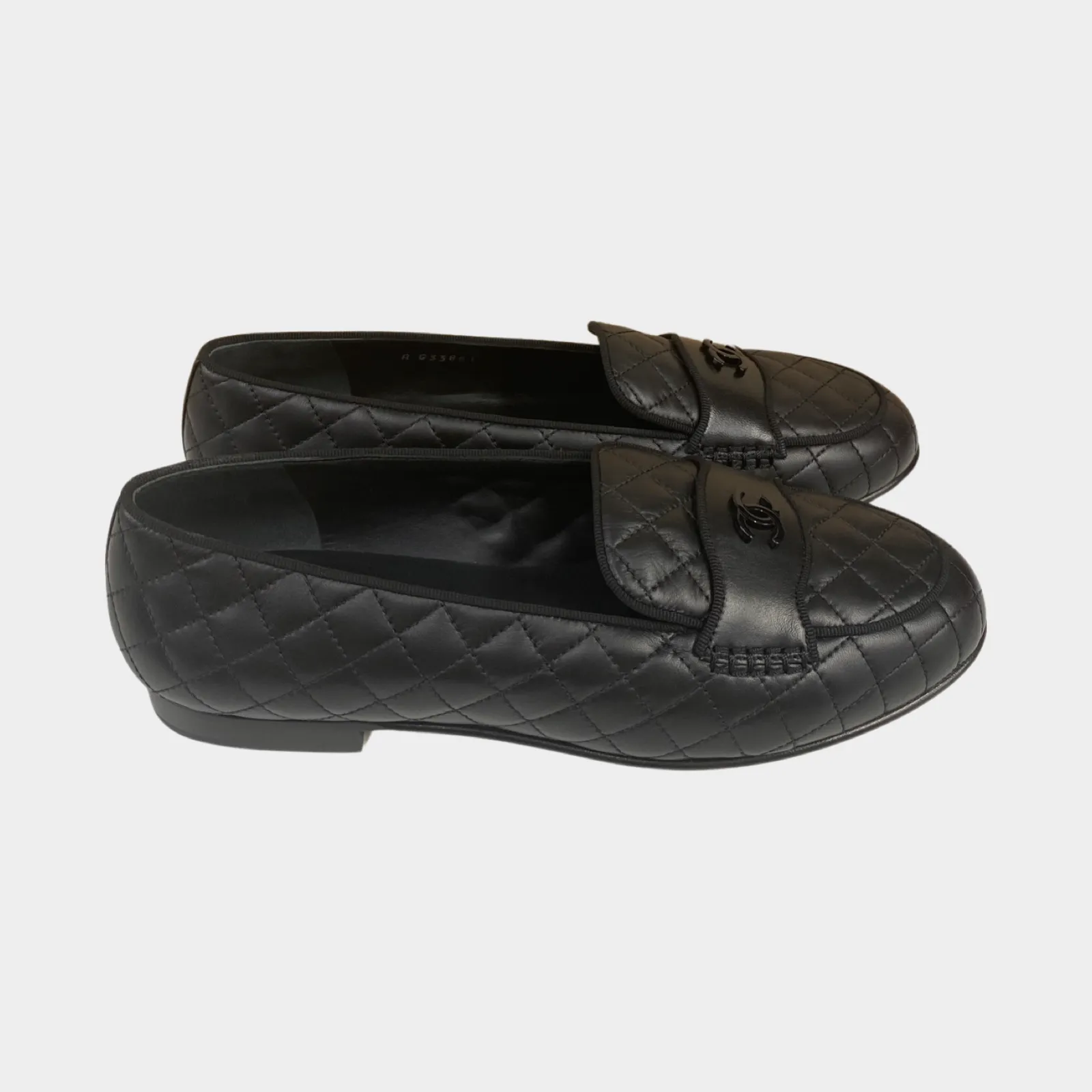 Chanel women's black quilted leather CC loafers